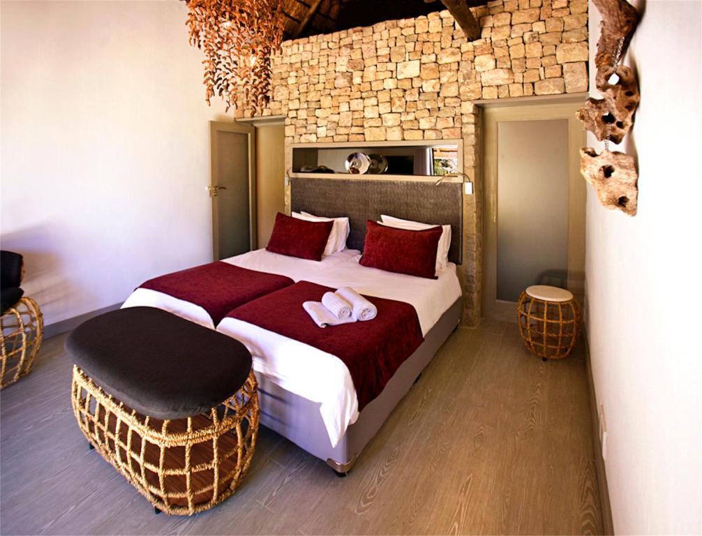 Вилла Mokuti Etosha Намутони Номер фото